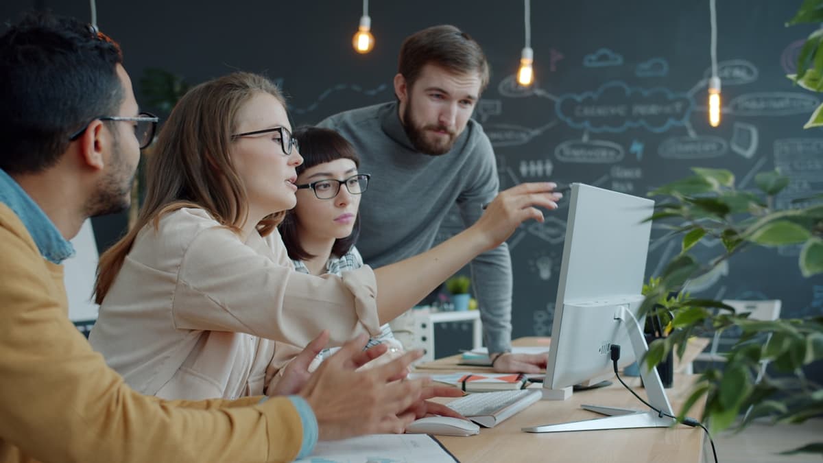 Engineers collaborating on software for a global engineering firm