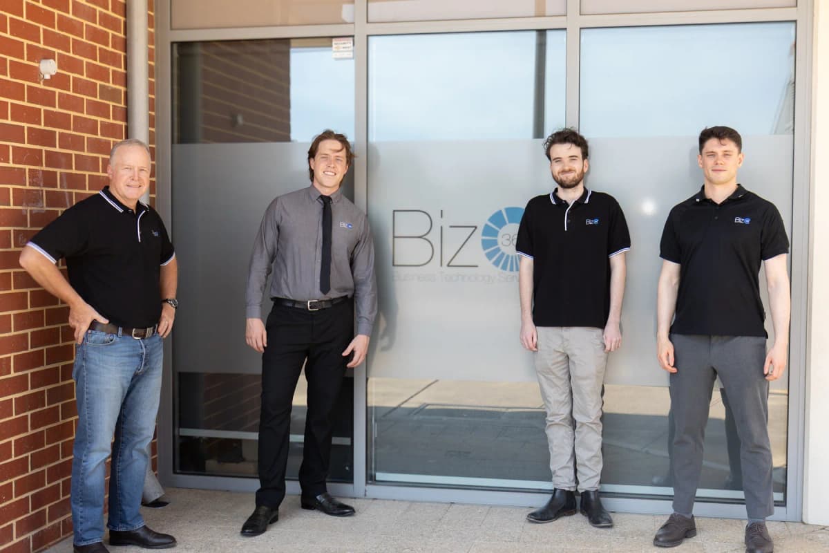 The Biz365 team working together