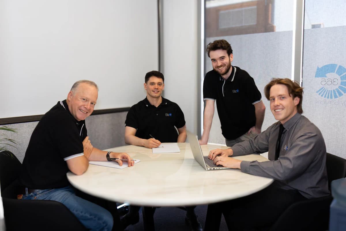 The Biz365 team in a meeting